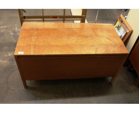 A Meredew light oak blanket box, having lift-up lid raised on square section supports, 92cm