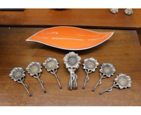 A plated and enamel decorated leaf shaped fruit dish; and a collection of decorative plated rose ornaments 