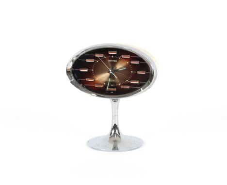 A Japanese "Rhythm" chrome and plastic alarm clock