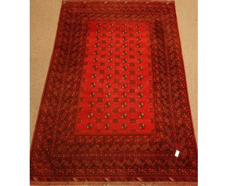 Afghan Bokhara red ground rug carpet, 295cm x 200cm   Condition Report   Click here for further images, condition, auction ti