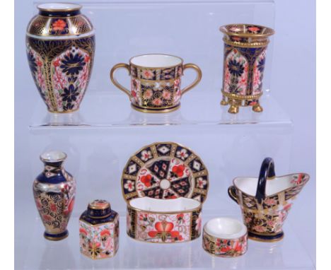 Early 20th Century Royal Crown Derby miniature ceramics; vase no.1128, footed vase no.1128, coal bucket no.6299, loving cup n