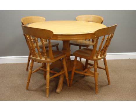 Light wood circular extending dining table with foldout leaf (D110cm - L149cm (extended)), and four farmhouse dining chairs