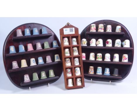Set of twenty Wedgwood Jasperware thimbles, Royal Worcester hand painted enamelled thimble by Graham Payne, Coalport and othe