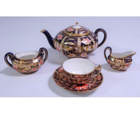 Early 20th Century Royal Crown Derby Imari pattern no. 6629 miniature teaware; teapot, pouring jug, tea cup and saucer and su