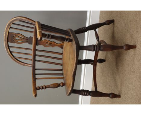 19th century yew wood and elm Windsor armchair, turned supports with crinoline stretcher, double bow stick and pieced splat b