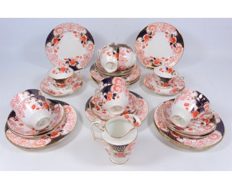 Early 20th Century Crown Staffordshire tea service decorated in the Imari palette, twelve place settings