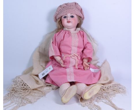 Early 20th Century SFBJ bisque head doll with composite jointed body and glass eyes, impressed 'SFBJ 60 Paris -3-' H52cm    C