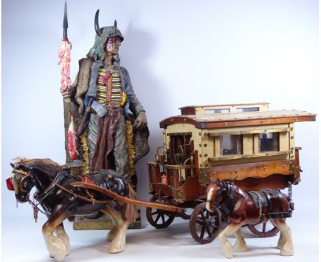 Large resin figure of a Native American warrior, H76cm, large wooden model of a gypsy caravan with two ceramic shire horses (