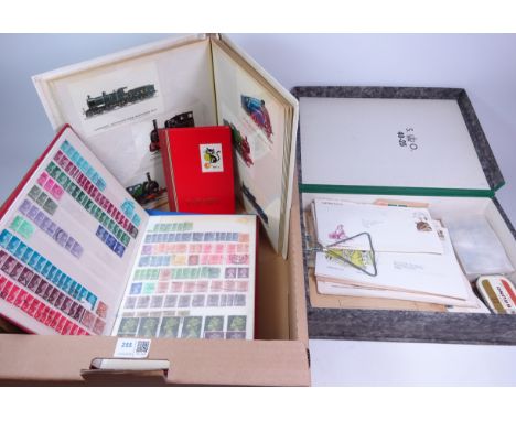 British and world stamps in five albums, loose stamps, first day covers and a postcard album containing Steam Engine postcard