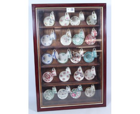 Coalport, Spode, Crown Staffordshire miniature cups and saucers (20 sets) in glazed display case H54cm x W36cm    Condition R