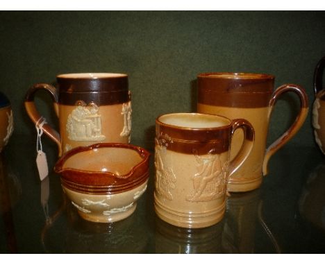 THREE DOULTON SALT GLAZED TANKARDS, hunting wares and plain and a Doulton pot of similar design, all impressed marks, height 