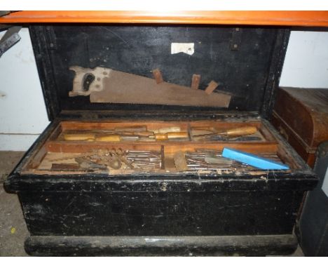 A WOODEN CRATE, containing various vintage tools