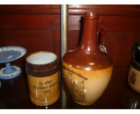 ROYAL DOULTON SALT GLAZED 'YE OLDE CHESHIRE CHEESE' WHISKY FLASK, and a similar tankard, impressed marks to both (2)