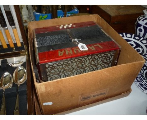 A BOXED LAGUNA ACCORDION