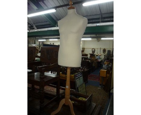 A GENTS TORSO SHOP WINDOW MANNEQUIN, on tripod stand