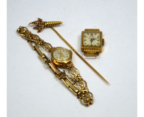 A SMALL COLLECTION OF ITEMS, to include a stick pin, a 9ct gold ladies watch and a watch face