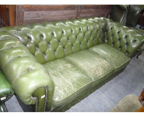 A GREEN LEATHER CHESTERFIELD SOFA, (s.d.)