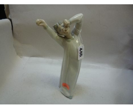 A LLADRO FIGURE OF BOY YAWNING