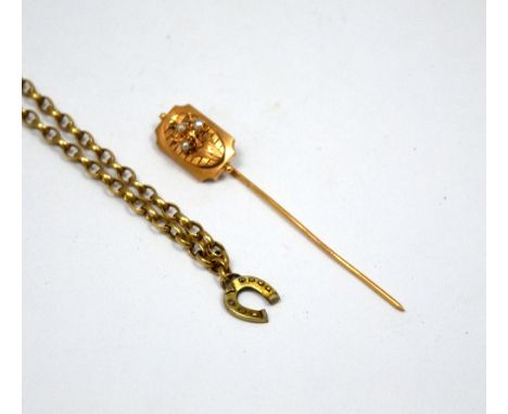 TWO ITEMS OF JEWELLERY, the first a stick pin togehter with a belcher chain and pendant