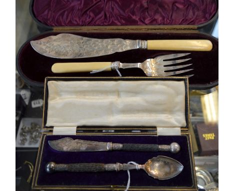 A PAIR OF CASED FISH SERVERS, together with a boxed knife and fork