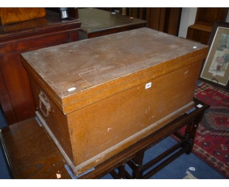 A BRUSH GRAINED PINE TOOL CHEST, containing a quantity of various carpenters tools etc