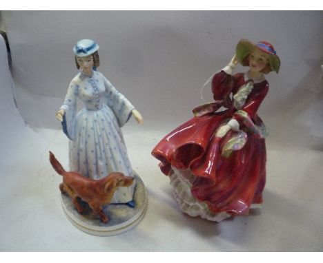 A ROYAL DOULTON FIGURE, 'Top O'the Hill' HN1834 and a Royal Worcester Limited Edition figure 'Felicity' No.747 (missing lead)