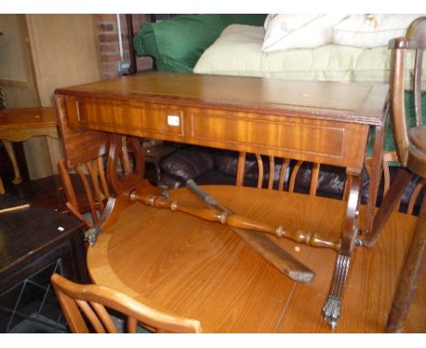 A MODERN MAHOGANY SOFA TABLE