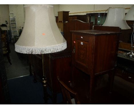 AN EDWARDIAN MAHOGANY INLAID BEDSIDE CABINET, and a brass standard lamp with shade (2)