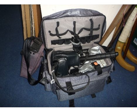 A MINOLTA CAMERA, case and accessories