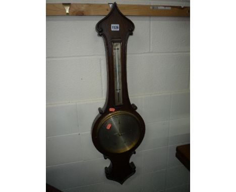 AN OAK CASED WALL BAROMETER