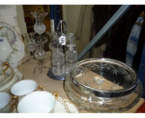 A FOUR BOTTLED CRUET STAND, a small four branch epergne stand and a glass footed bowl (3)