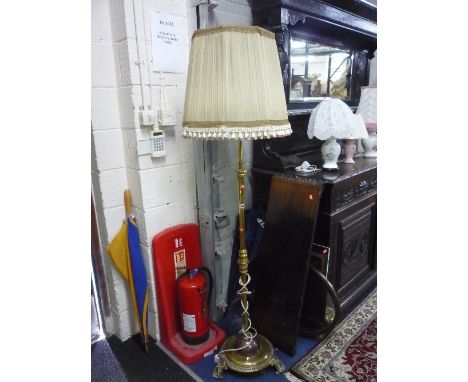 A BRASS AND COPPER STANDARD LAMP, with shade and three table lamps with shades (4)