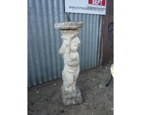 A CONCRETE SUNDIAL, with cherub support