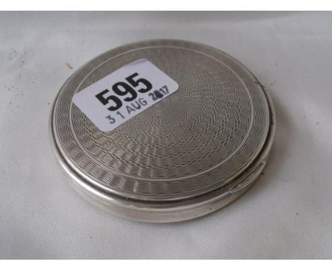 A circular compact with hinge cover 3” diameter    