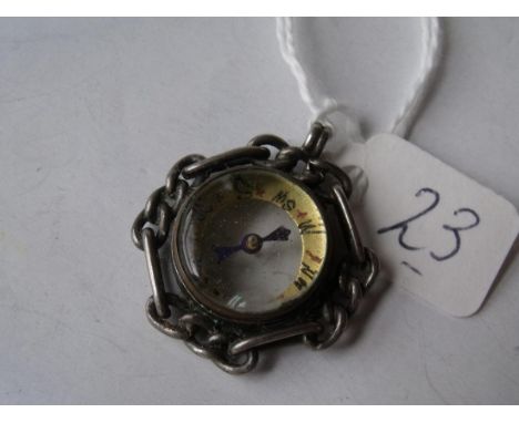 A silver mounted compass with chain link border 2.4cm dia
