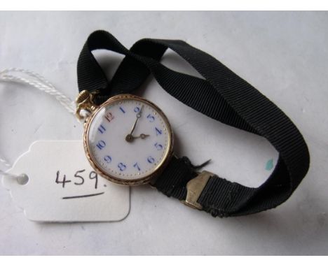 Another 18ct gold and enamel ladies watch decorated  with scrolls        