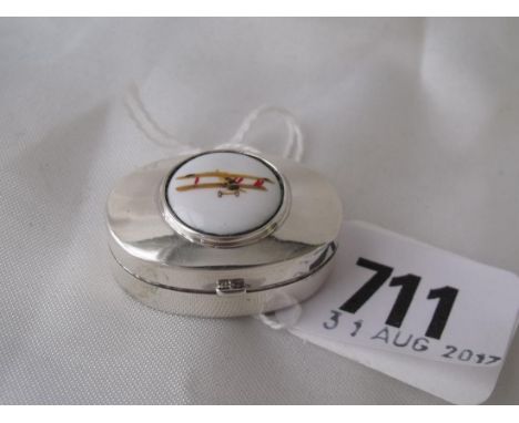 An oval silver enamel pill box with by plane motive  import mark        