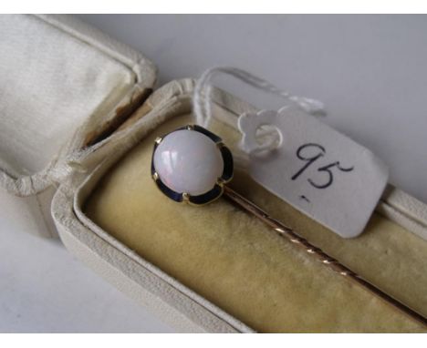 A good boxed opal & blue enamel gold mounted stick pin length 7cm