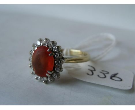Mexican fire opal ring set with diamond border mounted in  18ct gold approx size 'P'