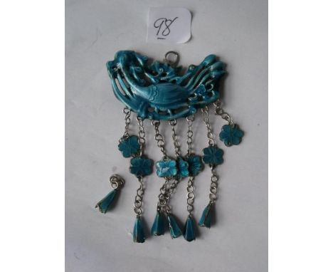 An unusual turquoise coloured enamel bird pendant with hanging drops 4cm wide