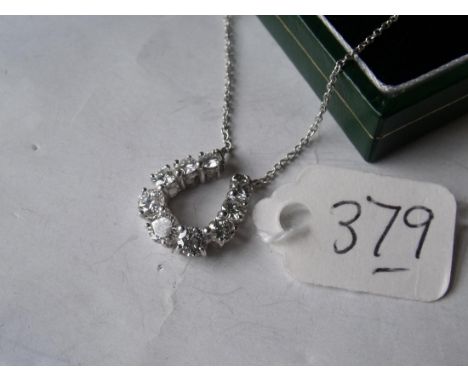 A FINE 18CT WHITE GOLD DIAMOND HORSESHOE pendant (1ct diamonds) on 18ct gold chain