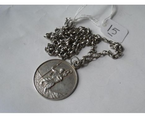 A silver pendant on chain