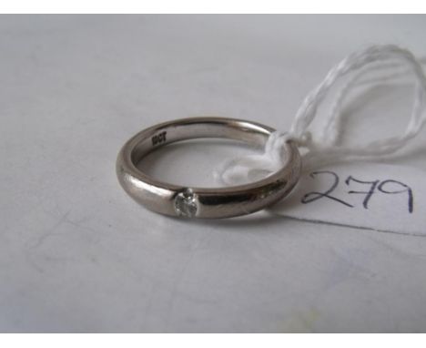 18ct white gold band ring set with a single diamond approx size 'K'  3.8g