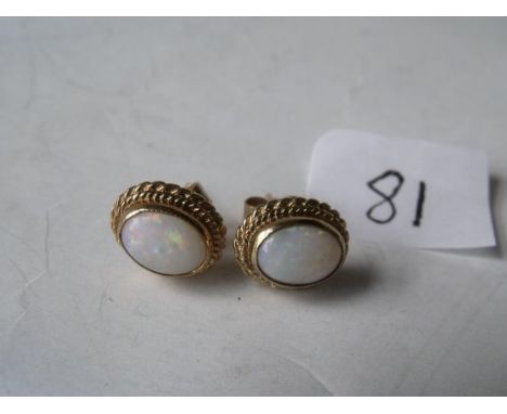Small pair of attractive 9ct & opal ear studs