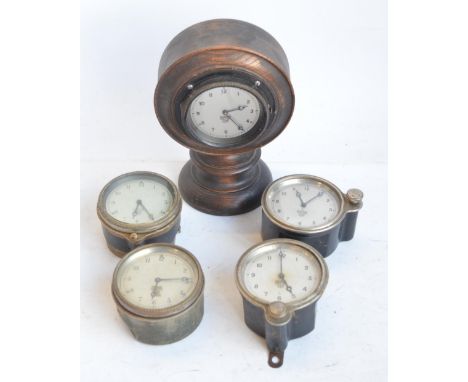 Five vintage car clocks by Smiths to include a desktop mounted example, H21cm 