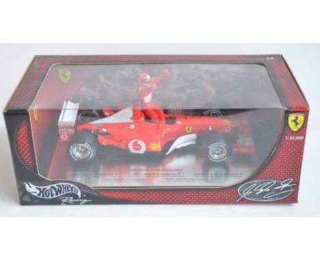 Boxed Hot Wheels Racing series 1/18 scale diecast Michael Schumacher Ferrari F1 car (item no 54614) with celebrating driver f