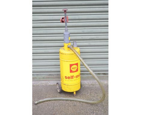 Vintage unrestored Shell two stroke self-mix hand operated oil pump, height with raised piston 86cm 