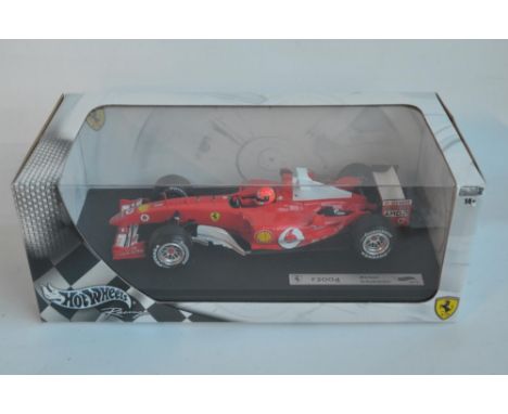 Hot Wheels Racing series 1/18 scale Ferrari F2004 Michael Schumacher with seated driver figure (model appears mint, box excel