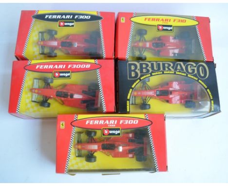 Five 1/24 scale Ferrari Formula 1 racing cars to include F300 1998, F310B etc. All models in mint condition, boxes at least v