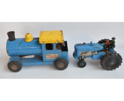 Vintage battery operated Reversible Diesel Electric tractor model by Marx (corrosion to battery compartment and play wear but